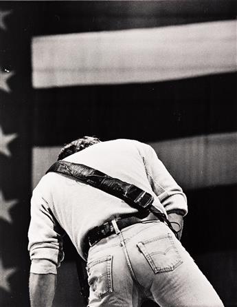 (BRUCE SPRINGSTEEN--ROCK MUSIC) A dynamic group of 9 photographs depicting The Boss in concert across the U.S.